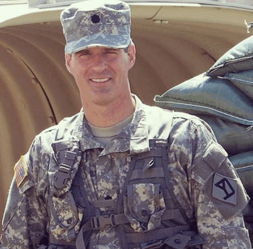 Scott Brown smiles in his National Guard uniform.